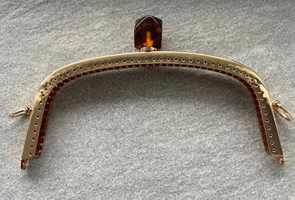 Chiusura Clutch Oro/Ambra