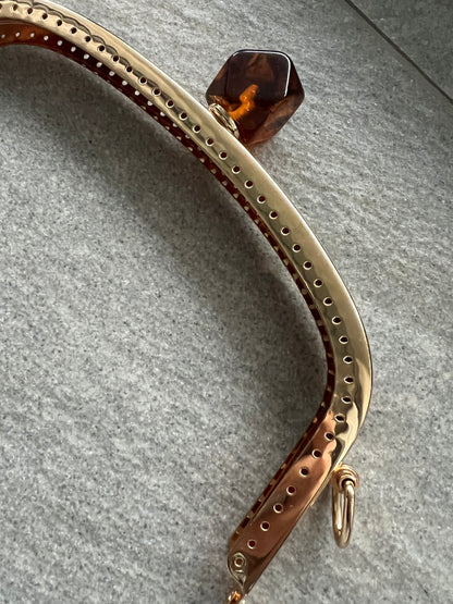 Chiusura Clutch Oro/Ambra